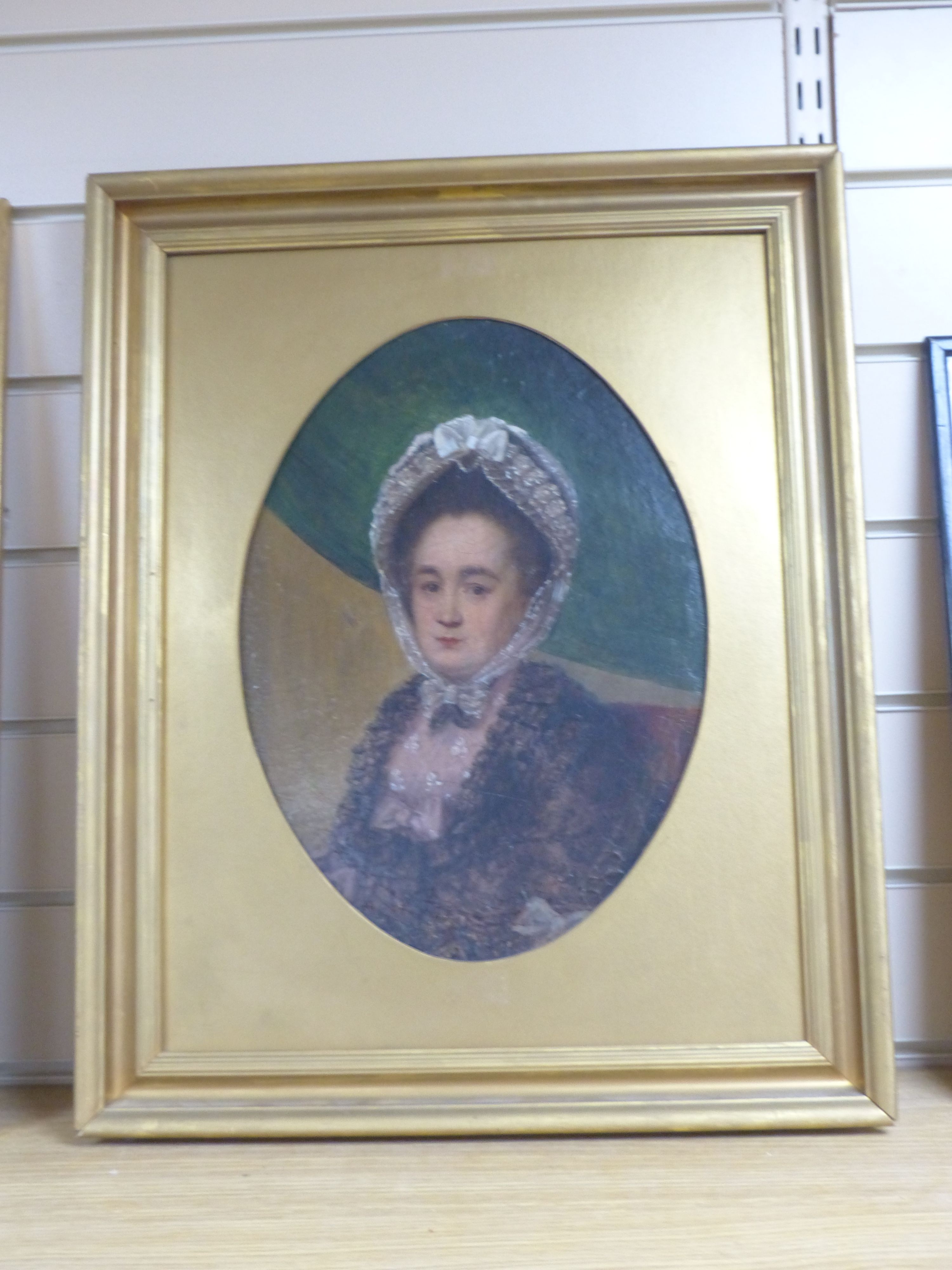 Victorian School, oil on board, Portrait of a lady wearing a lace bonnet, oval, 35 x 25cm